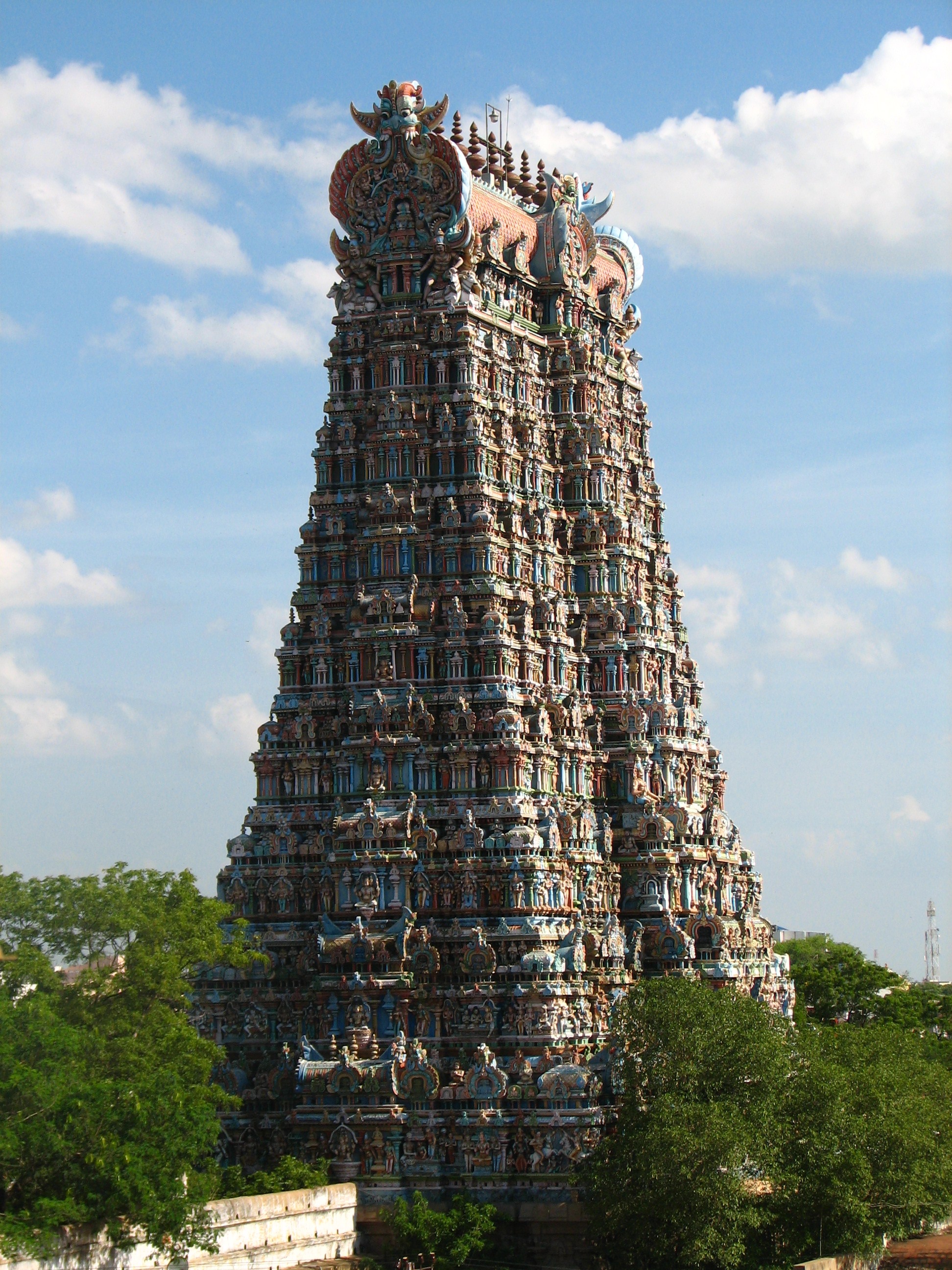 Vibrant gopuram tower of Meenakshi Amman Temple covered in colorful sculptures
